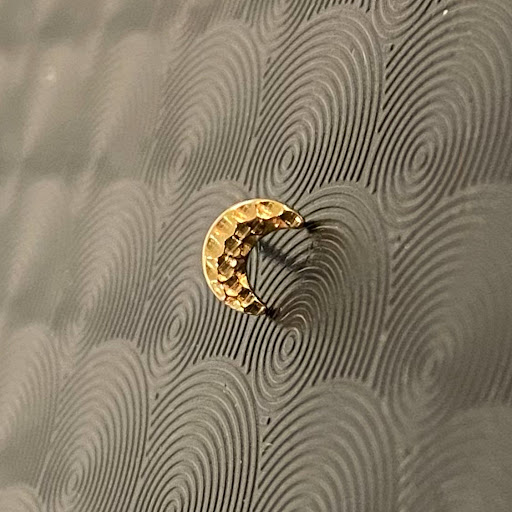 Explore ideas for ankle tattoos, creative tattoo ideas in Saint Paul, available at Electric Strawberry Piercing