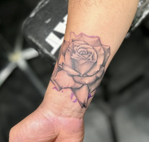 Explore rose foot tattoo ideas, creative tattoo ideas in Peoria, available at Modern Ink Tattoo