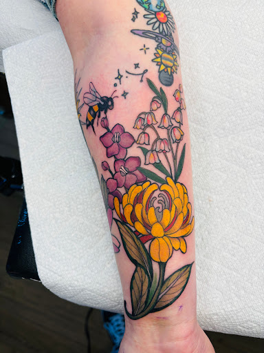 Find bracelet tattoo ideas for your next unique tattoo in Baldwinsville at Grand Line Tattoo