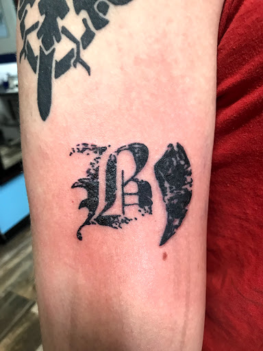 Explore ed hardy tattoo ideas, creative tattoo ideas in Frankfort, available at The Reef Tattoo