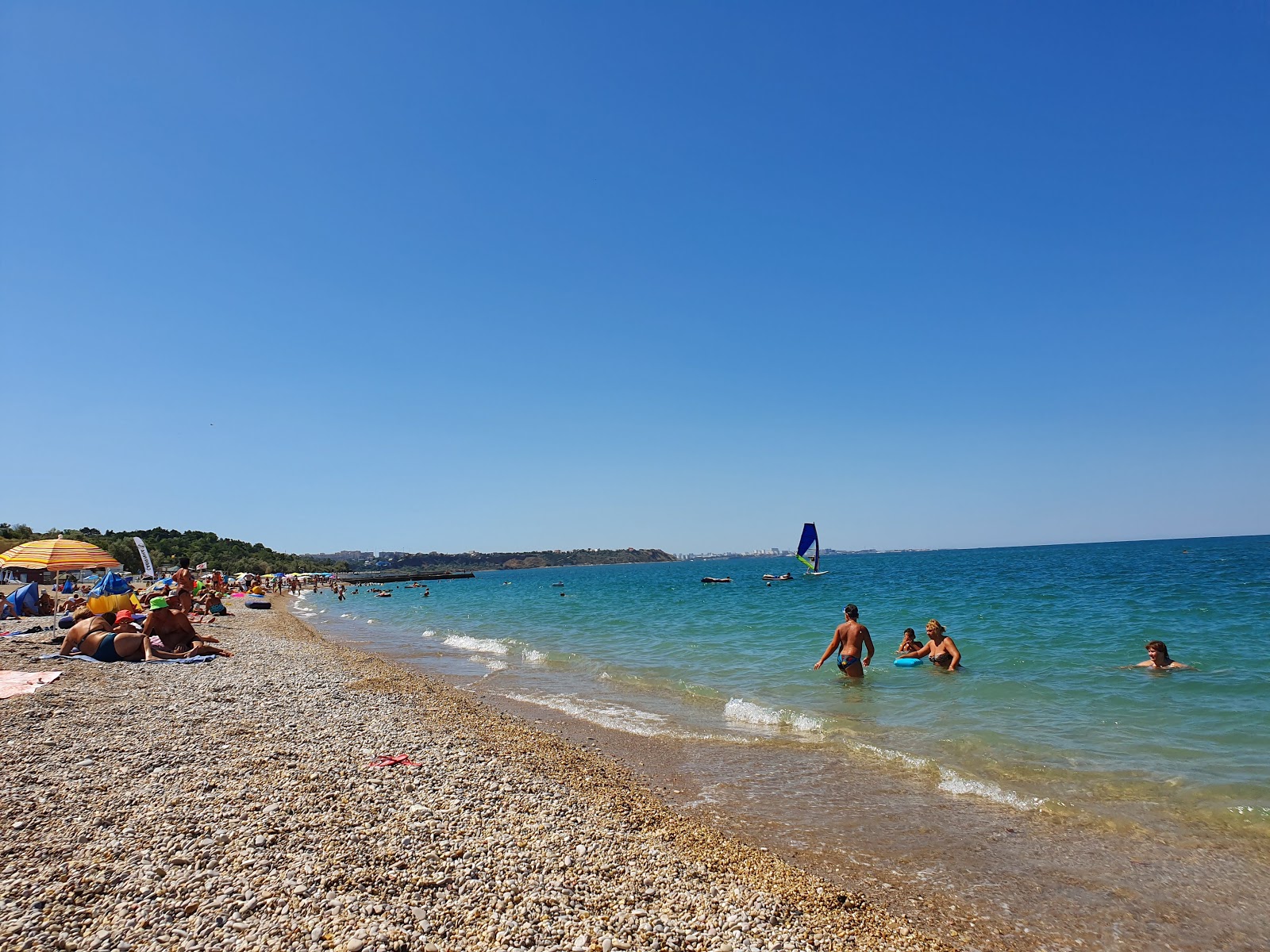 Photo of Lyubimovka beach with turquoise pure water surface