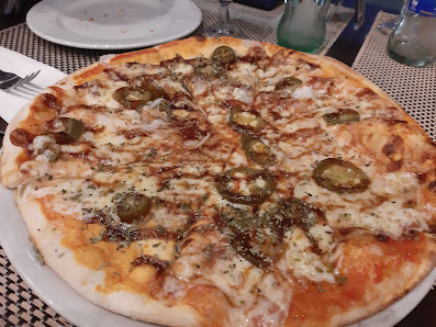 Restaurante Pizzería Cachitos C. Juan Morales Navarro, 17, 35300 Sta Brígida, Las Palmas, España