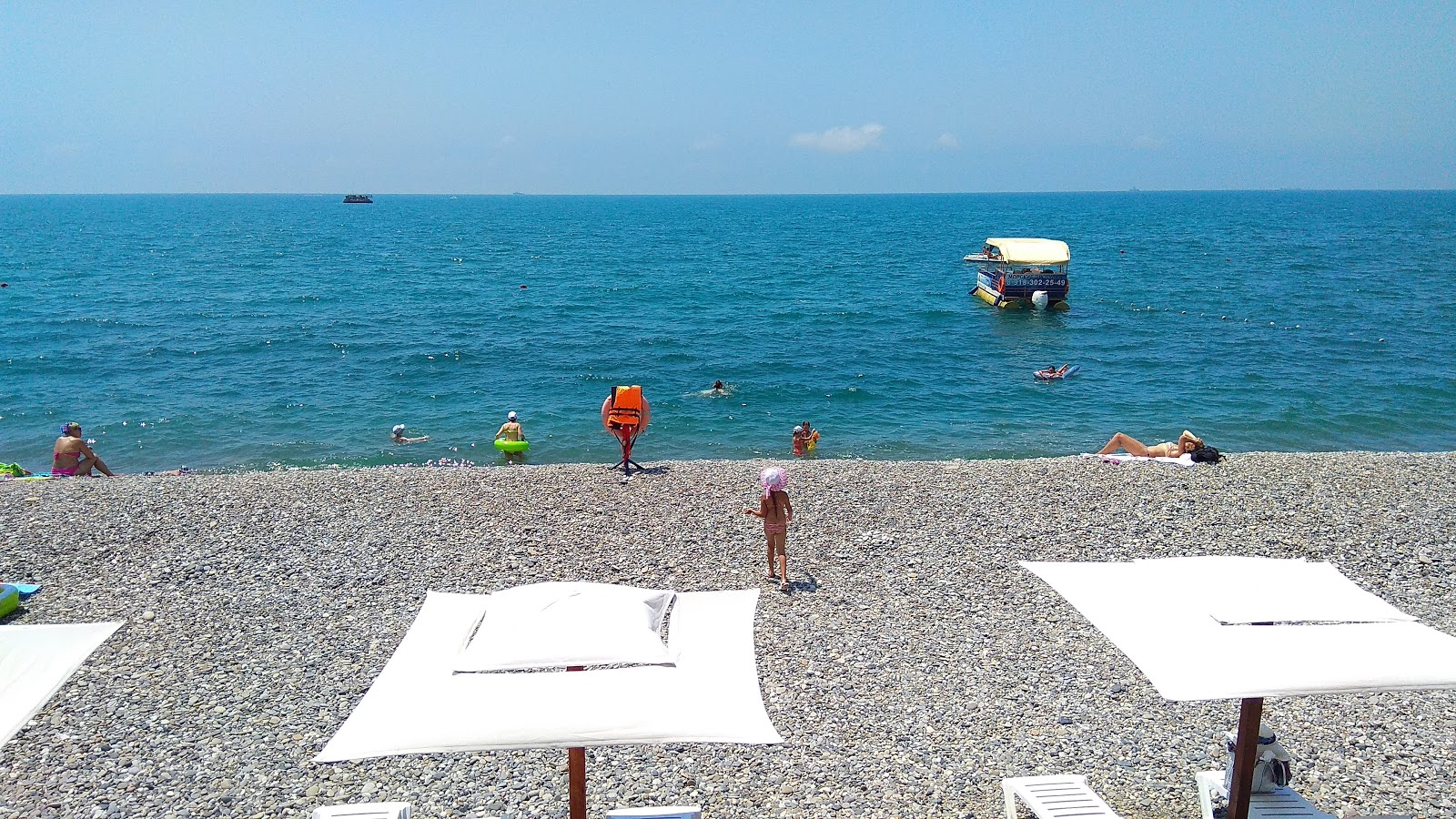 Foto von Robinson beach mit grauer kies Oberfläche