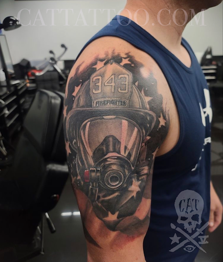 Explore male thigh tattoo ideas, creative tattoo ideas in Addison, available at Cat Tattoo