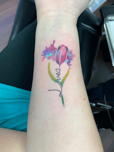 Explore gold tattoo ideas, creative tattoo ideas in Wake Forest, available at Revelation Ink Tattoo and Piercing