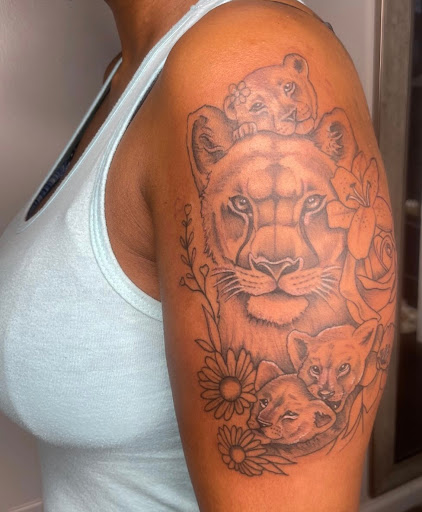 Explore flower foot tattoo ideas, creative tattoo ideas in Goshen, available at Stab Me Pretty Studio
