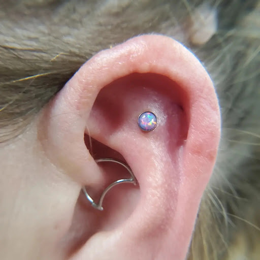 Explore rib tattoo ideas for women, creative tattoo ideas in Springfield, available at Nuclear Crayon Tattoo & Piercing