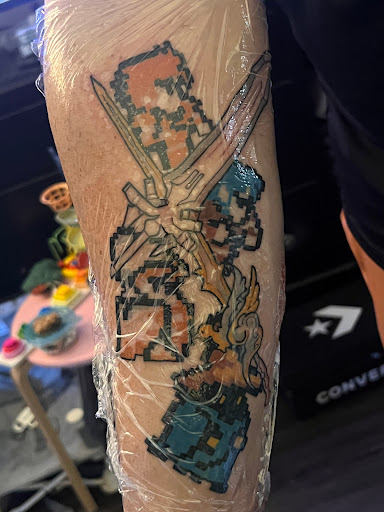 Explore smile tattoo ideas, creative tattoo ideas in Oak Grove, available at Hell or High Water Tattoo Shop