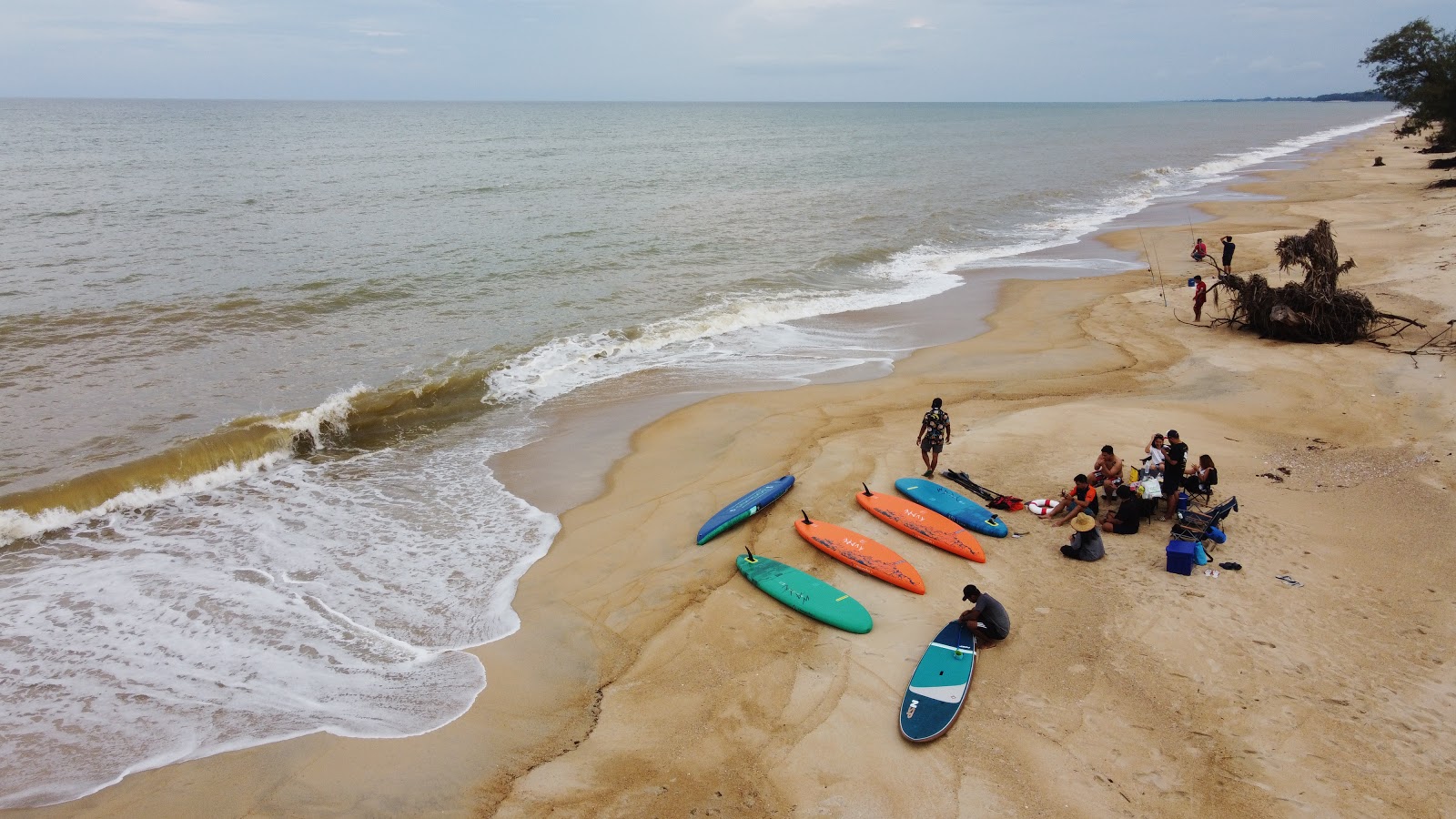 Foto de Sapom Beach com areia bege superfície