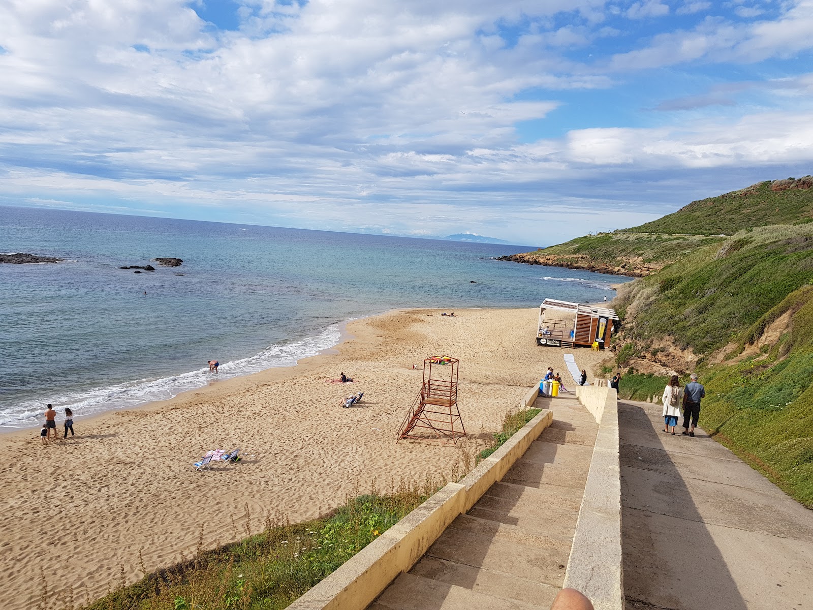 Fotografie cu Spiaggia di Ampurias - locul popular printre cunoscătorii de relaxare