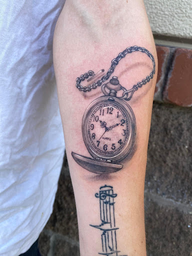 Explore small tattoo name ideas, creative tattoo ideas in Redmond, available at Four Flames Tattoo Studio