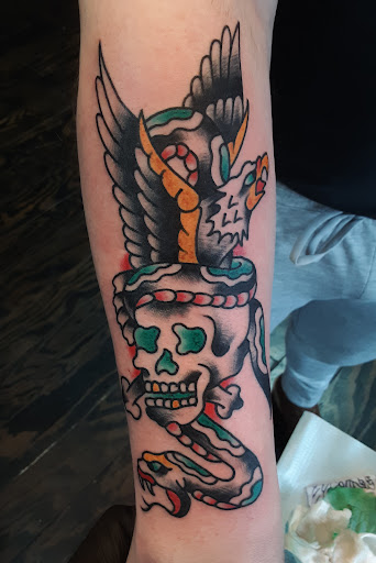 Explore calf tattoo ideas for females, creative tattoo ideas in Northfield, available at Trifecta Tattoo Parlor