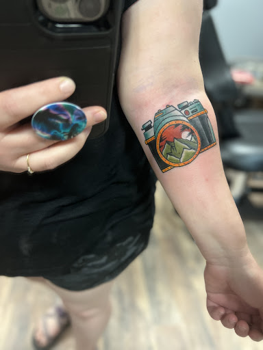 Explore small angel tattoo ideas, creative tattoo ideas in Seymour, available at 3 Sevens Tattoo