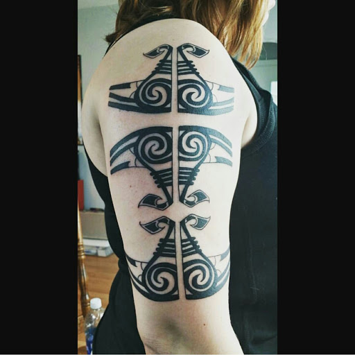 Explore father and son matching tattoo ideas, creative tattoo ideas in Port Aransas, available at SHARK ATTACK TATTOO