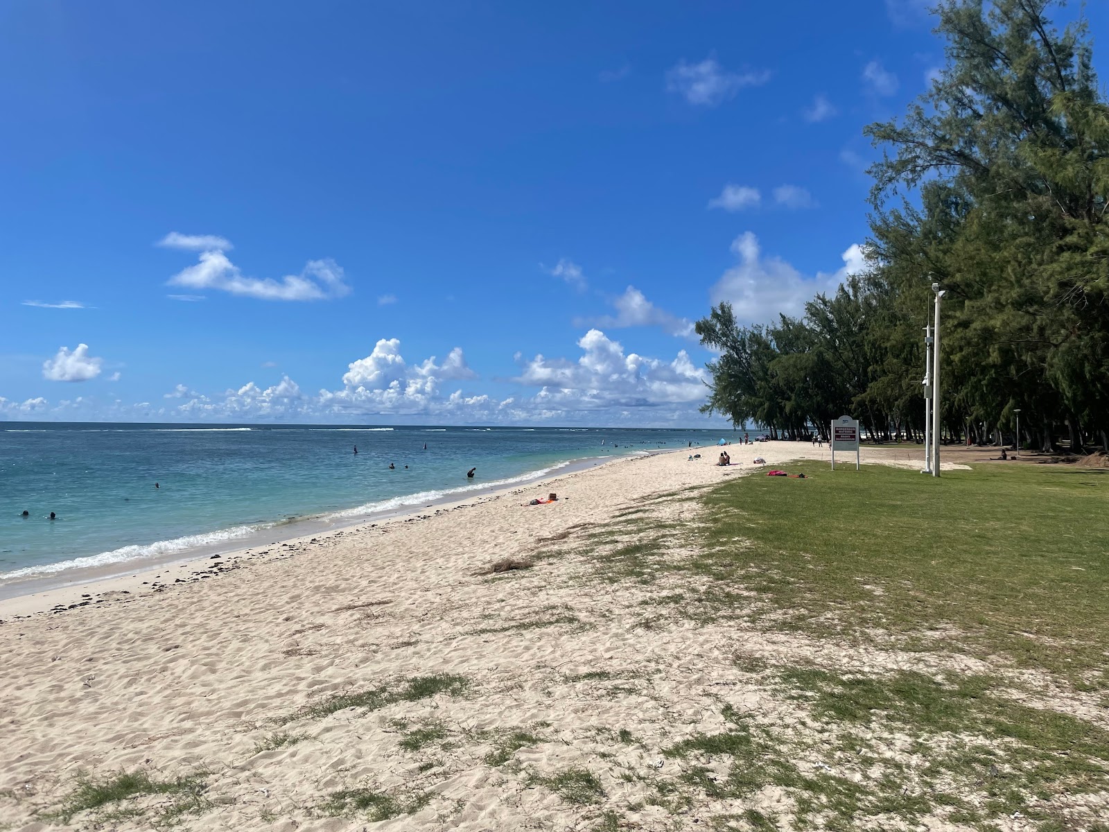 Foto af Flic En Flac Beach med lys fint sand overflade