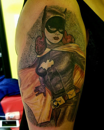 Explore concert tattoo ideas, creative tattoo ideas in East Northport, available at Tormented Souls