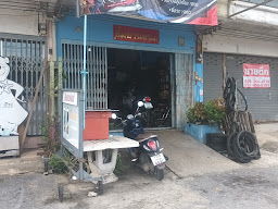 ร้าน ยิ้มยานยนต์