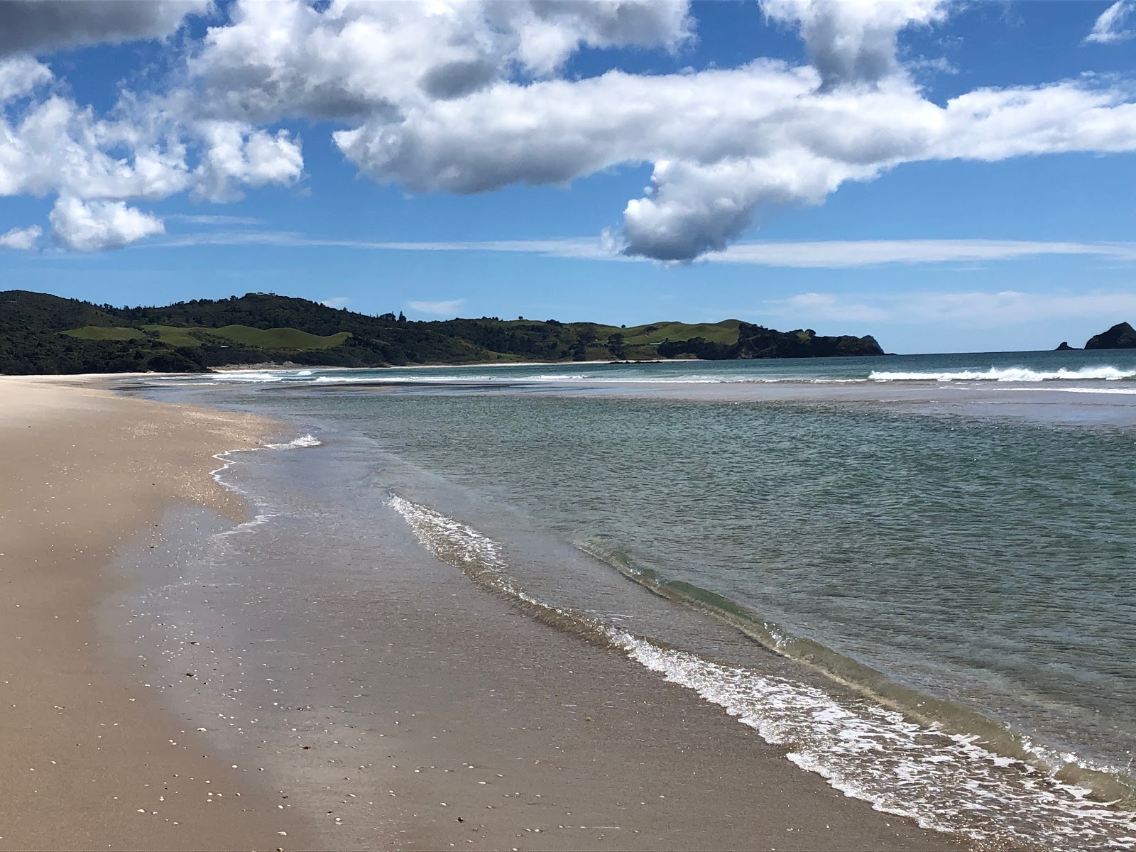 Photo of Kaitoke Beach with bright sand surface