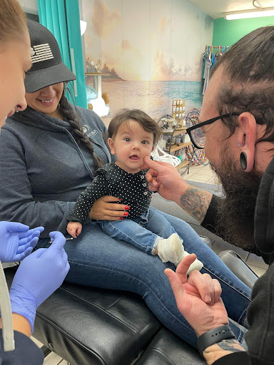 Find best travel tattoo ideas for your next unique tattoo in Nampa at Hippie Hoops and Holes