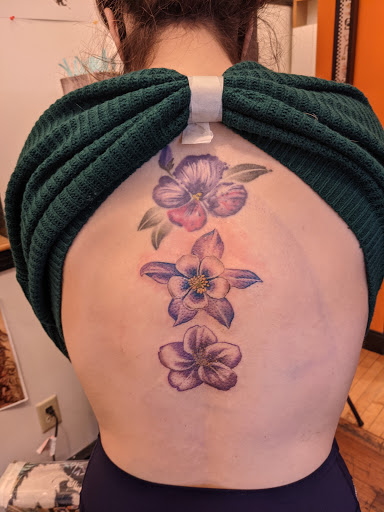 Explore small tattoo ideas for lower back, creative tattoo ideas in Jamaica Plain, available at Fat Rams Pumpkin Tattoo