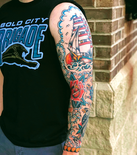 Explore tattoo ideas guns, creative tattoo ideas in Knoxville, available at Riverside Tattoo Co.