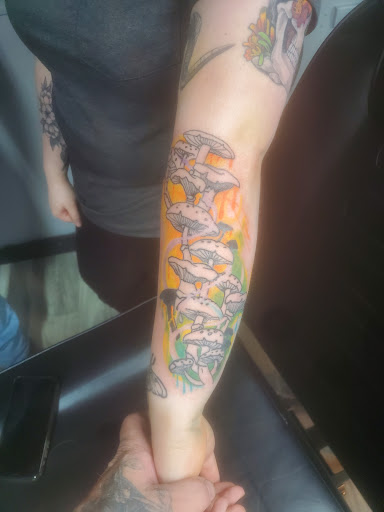 Explore arm tattoo ideas for women, creative tattoo ideas in Elyria, available at Raven Ink Tattoo & Piercing