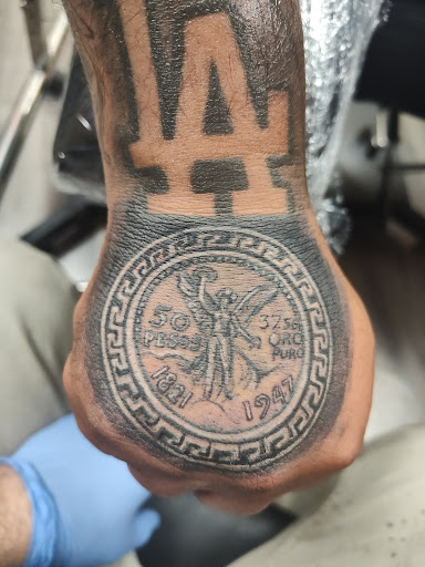 Explore men's back tattoos ideas, creative tattoo ideas in South Sioux City, available at Hometown Hustle Tattoo