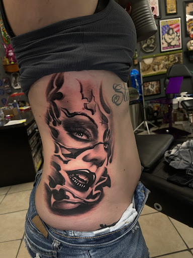 Explore totem pole tattoo ideas, creative tattoo ideas in Henrico, available at West End Tattoo & Piercing