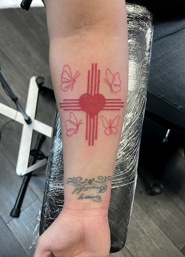 Explore simple silver lining tattoo ideas, creative tattoo ideas in Silver City, available at Independent Ink Tattoo