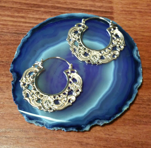 Explore simple spine tattoo ideas, creative tattoo ideas in Austin, available at Shaman Modifications Tattoo and Body Piercing North Austin