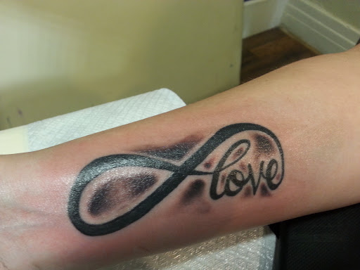 Find king crown tattoo ideas for your next unique tattoo in Buffalo at Madd Ink Tattoo & Piercing