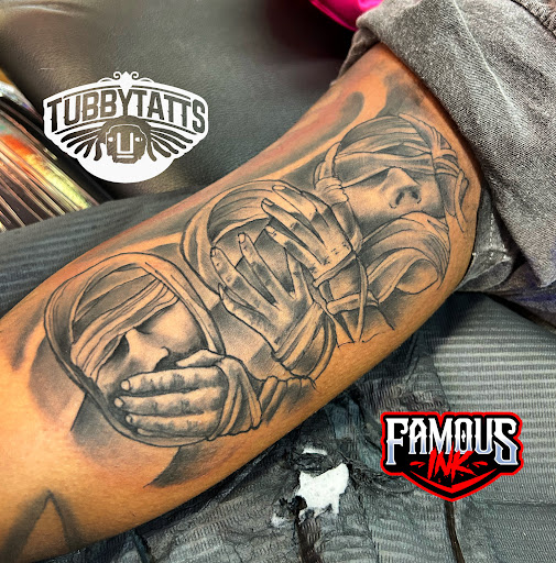 Explore back tattoo ideas men, creative tattoo ideas in Hammond, available at Famous Ink, Inc.