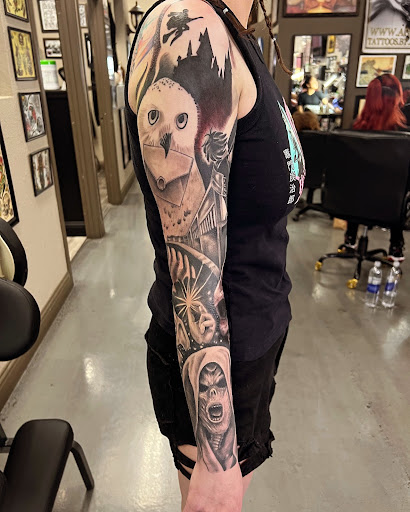 Explore photographer tattoo ideas, creative tattoo ideas in Modesto, available at Ink Disciples Tattoo Parlor