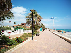 Foto di Spiaggia di Almenara con baia lunga