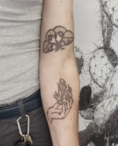 Explore swimming tattoo ideas, creative tattoo ideas in Carefree, available at Lucid Arts - Design & Tattoo