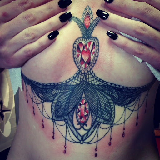 Explore tattoo ideas for neck, creative tattoo ideas in Seaford, available at Irish Buddha Tattoo Studio