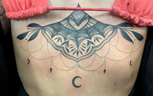 Explore rock tattoo ideas, creative tattoo ideas in Abingdon, available at Lone Sparrow Tattoo Shop