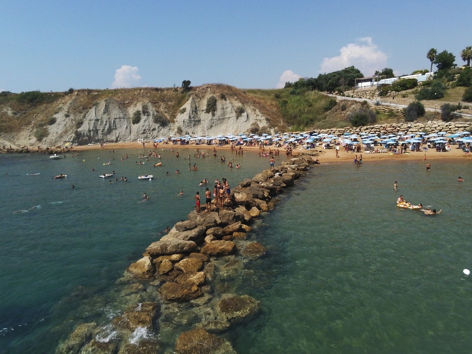 Foto di Santa Cristina beach con una superficie del acqua blu