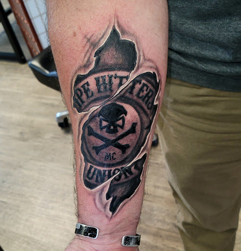 Explore face tattoo ideas for men, creative tattoo ideas in Richmond, available at Art Period llc Tattoos and Artwork by Leigh Odom