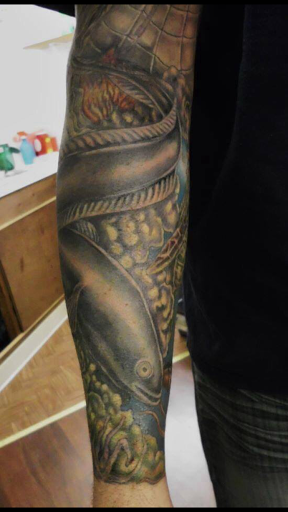 Explore mens back tattoos ideas, creative tattoo ideas in Alfred, available at Utopian tattoo and body piercing