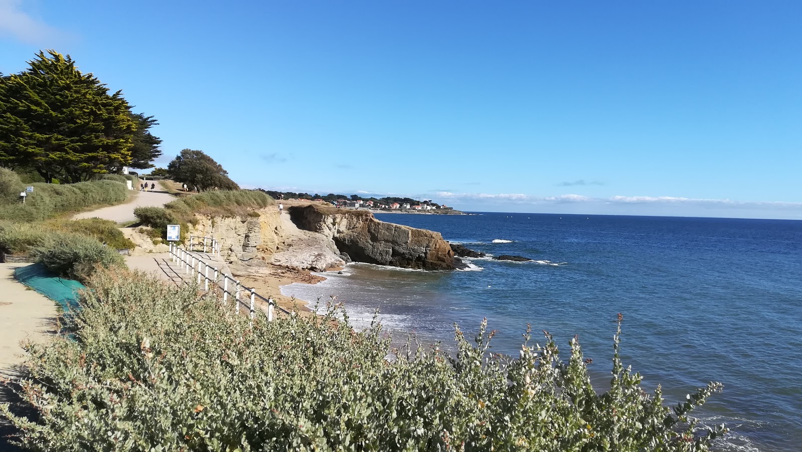 Foto de Raize beach con arena beige superficie