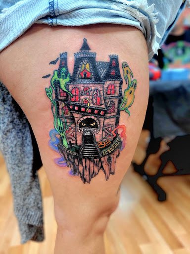 Explore stomach tattoo ideas for females, creative tattoo ideas in Benton, available at Spectrum Tattoo