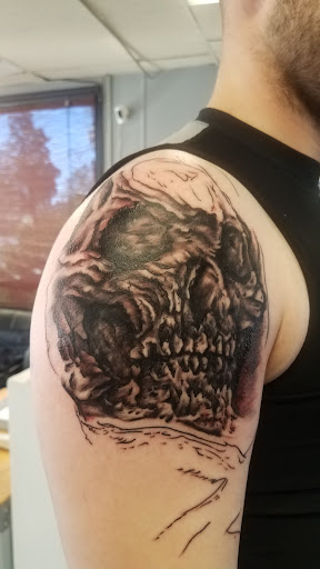 Explore knuckle tattoo ideas for men, creative tattoo ideas in Yorktown, available at Army Navy Tattoo