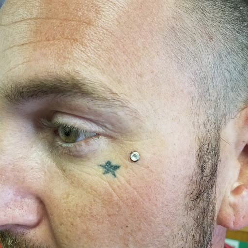 Explore tattoo cover up ideas for females, creative tattoo ideas in Hudson Falls, available at ALTERED ADDICTION TATTOOS