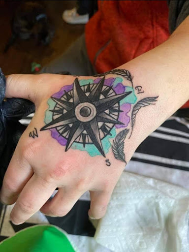 Explore red ink tattoo ideas for guys, creative tattoo ideas in Defiance, available at Handcrafted Body Art