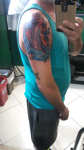 Explore cover up tattoo ideas black, creative tattoo ideas in Cape Coral, available at The Tattoo Emporium