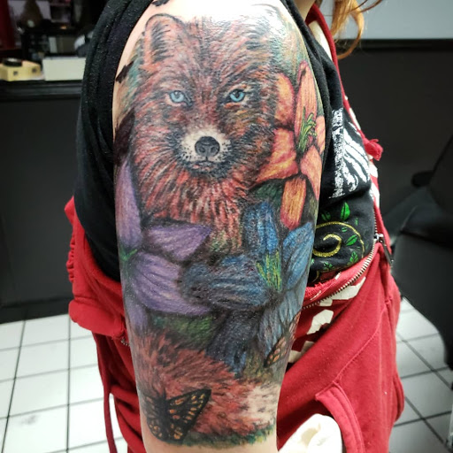 Find best dog tattoo ideas for your next unique tattoo in Erie at EliKingInk