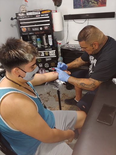 Explore tattoo name ideas for men, creative tattoo ideas in El Paso, available at Santa Rosa Tattoo Studio