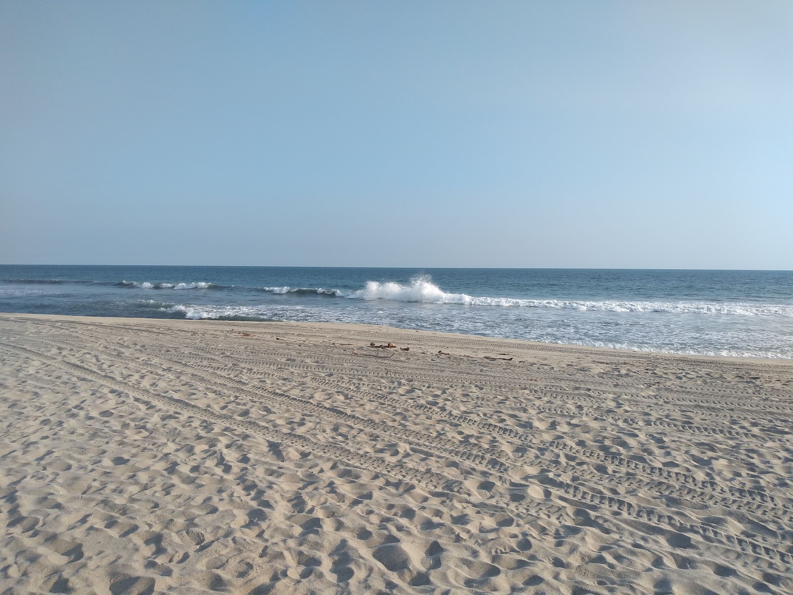 Fotografija Grande beach z svetel pesek površino