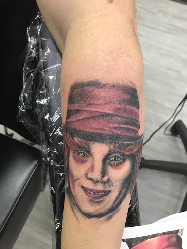 Find face tattoo idea for your next unique tattoo in Grenada at HeadSpace Tattoo